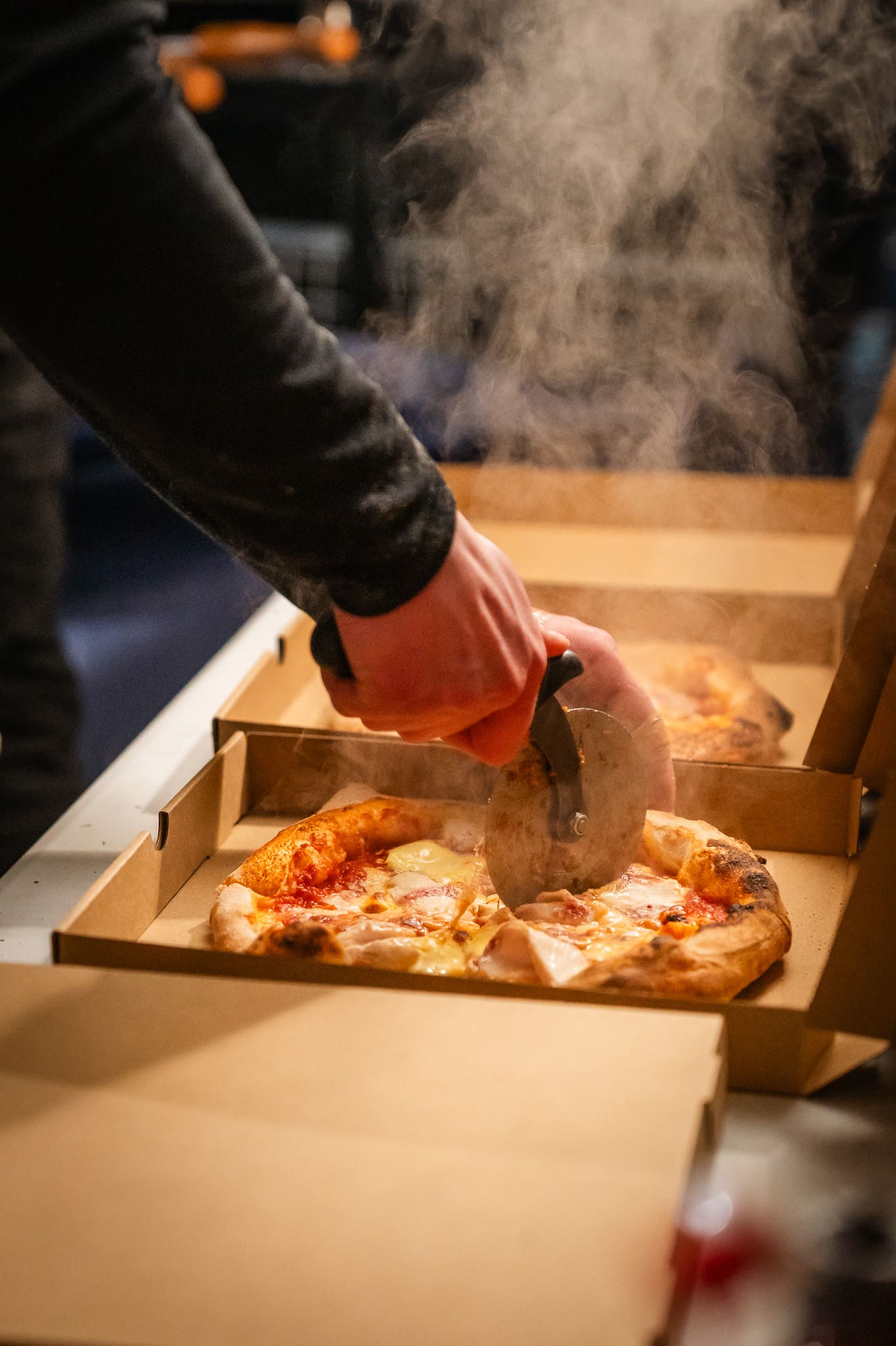 Guests enjoying pizza
